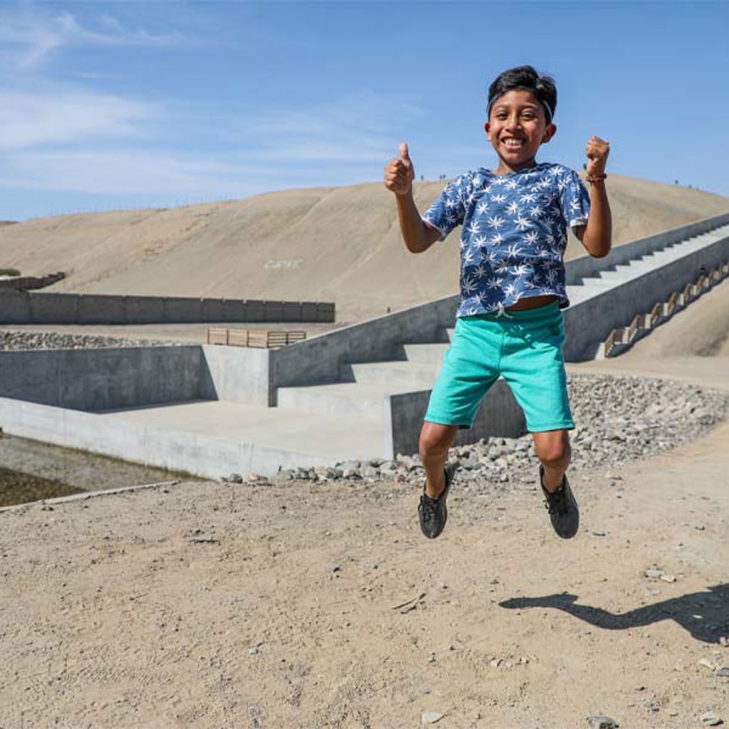 A boy jumping in the air.