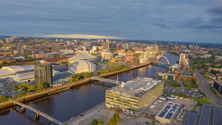 A city with a river and a bridge.