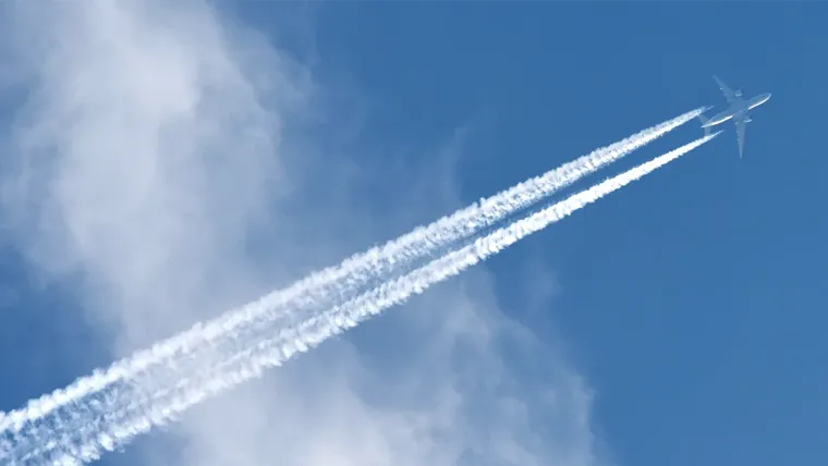 A plane flying in the sky.
