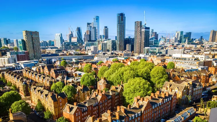 London cityscape with red-brick residential buildings and modern skyscrapers