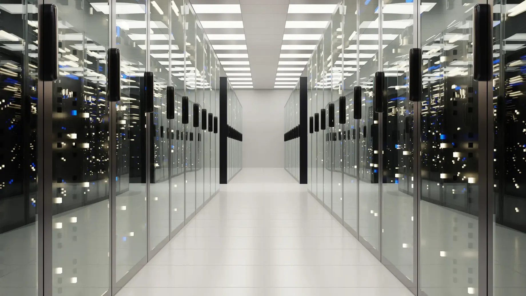 A long hallway with rows of computer servers in a data centre