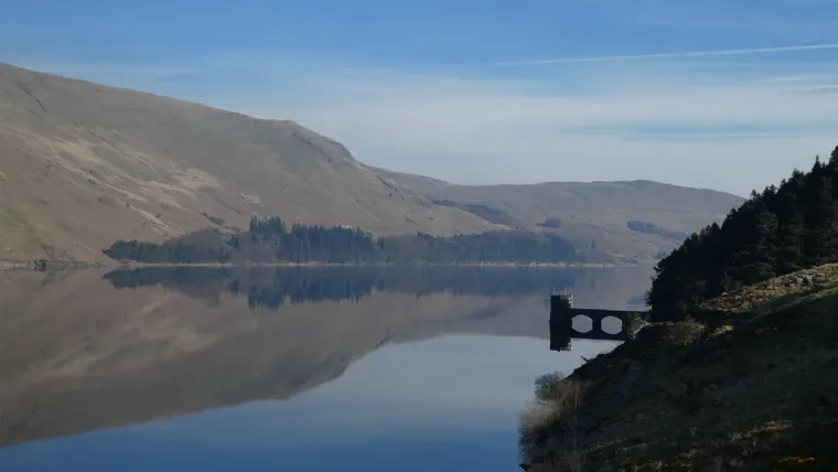 A lake surrounded by hills.