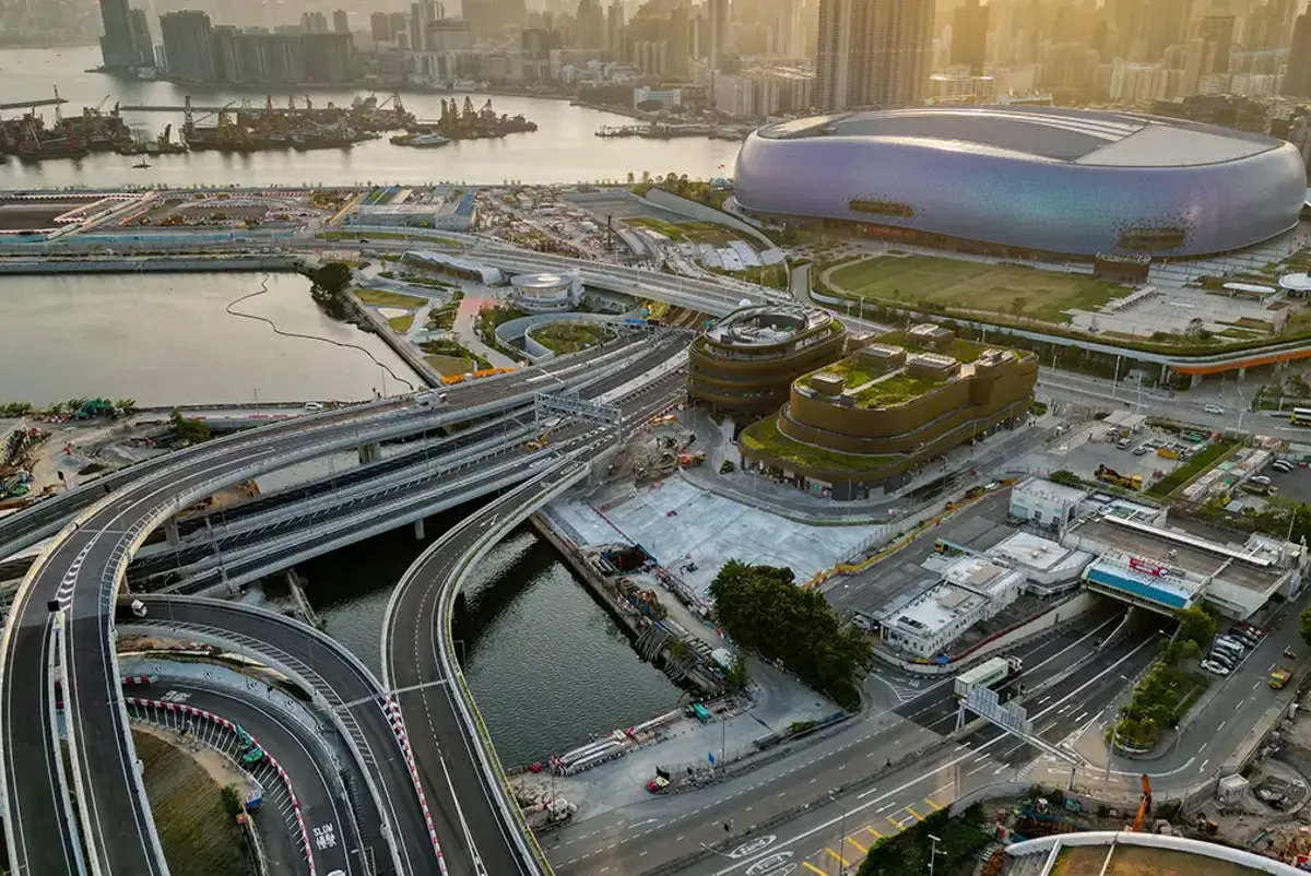 A large building with a dome on top and a large circular building in the middle.