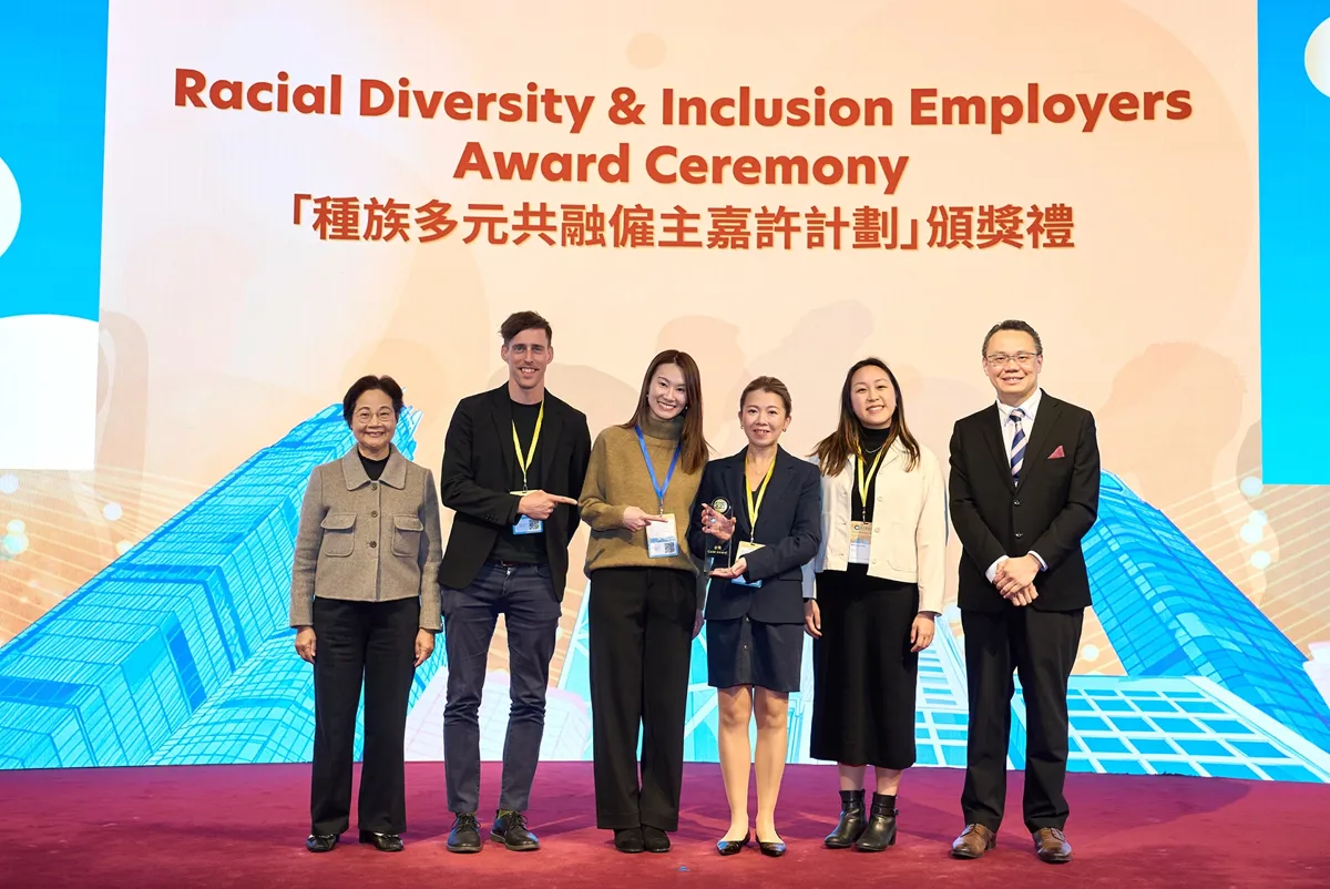 A group of people posing for a photo.