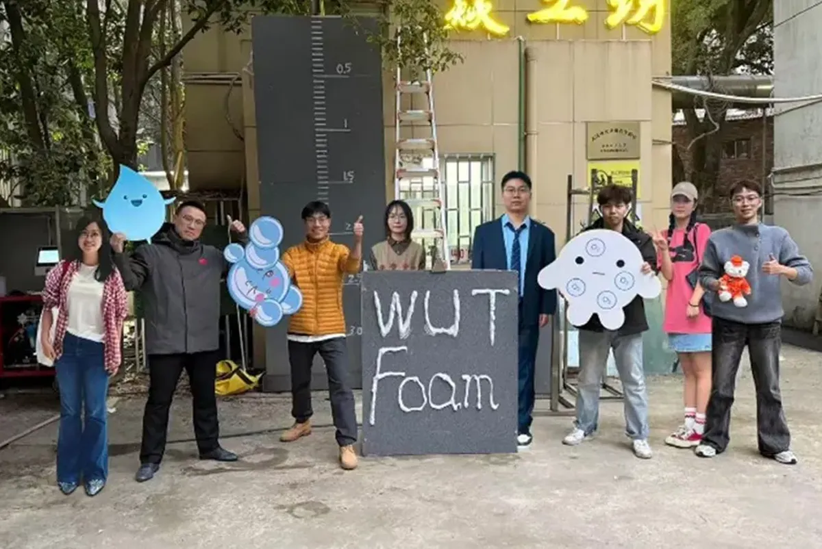 A group of people holding signs.