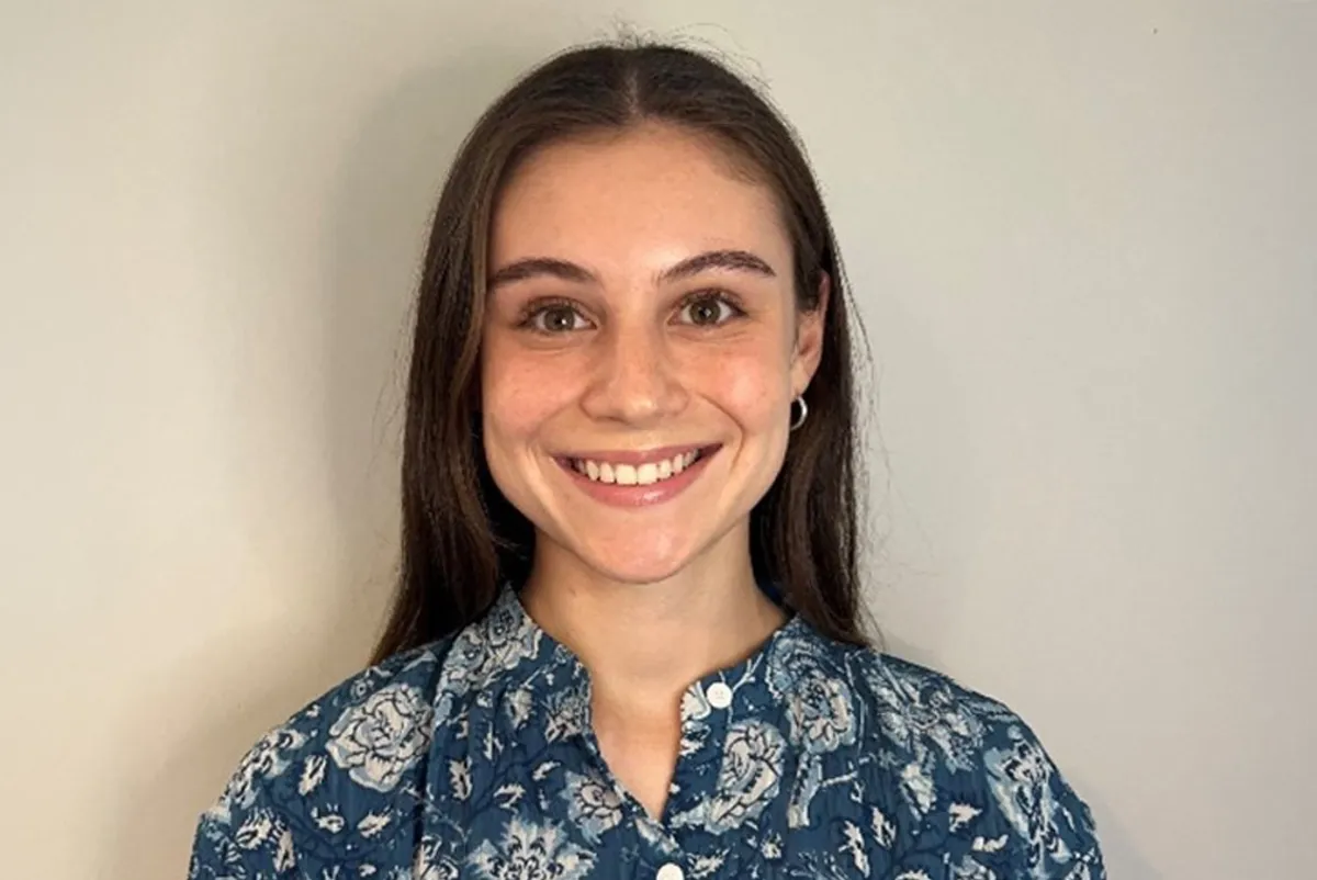 A person smiling for the camera.