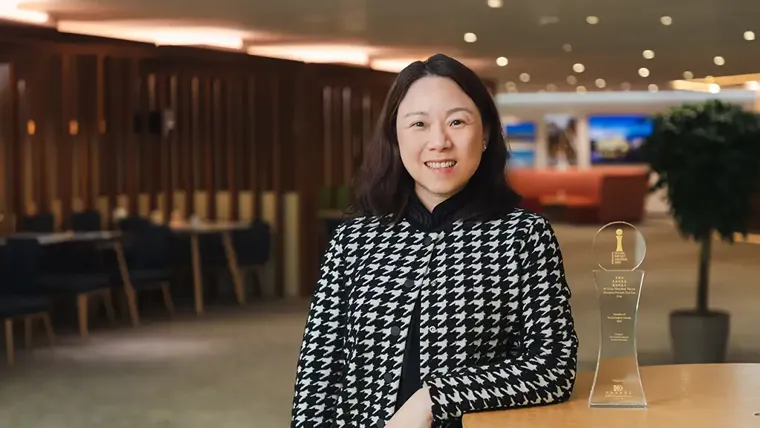 A woman standing in a room.