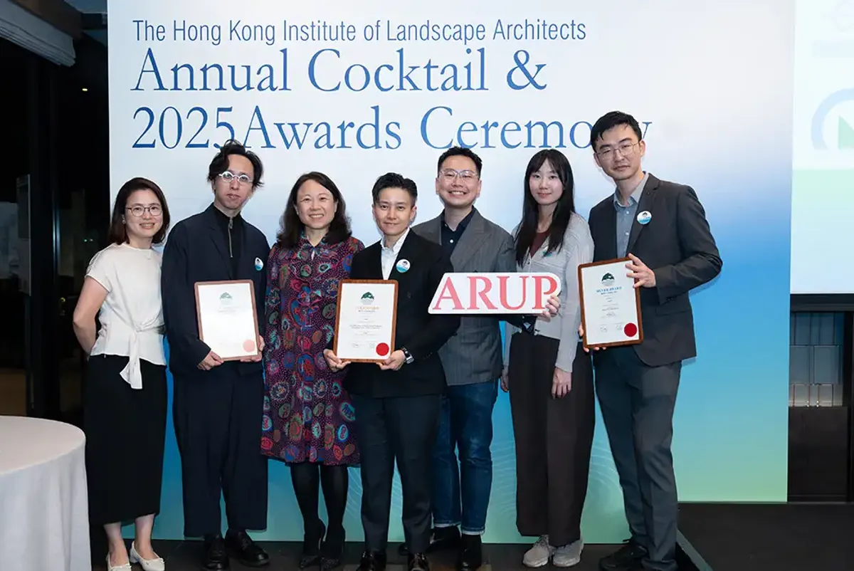 A group of people holding certificates.