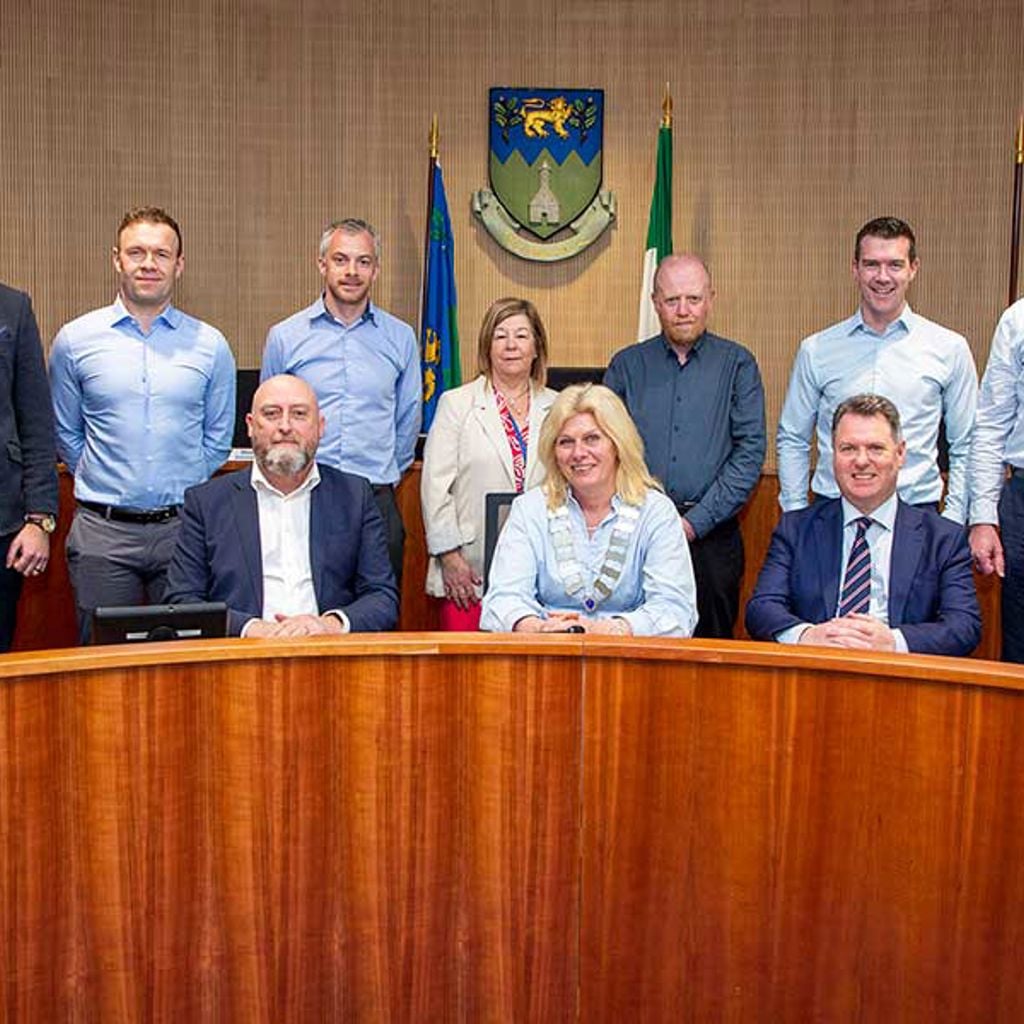 Group photo of contract signing for phases 3 and 4 of the N11/M11 bus priority interim scheme.