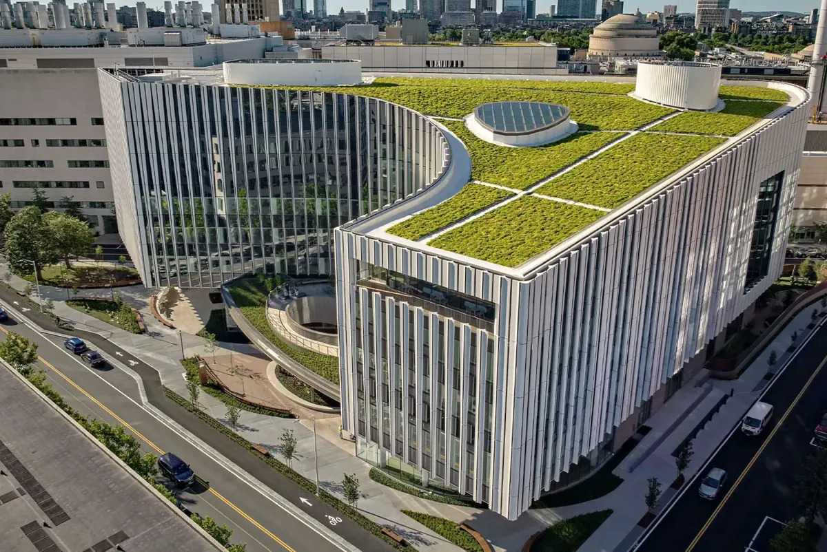 A large building with a green roof.