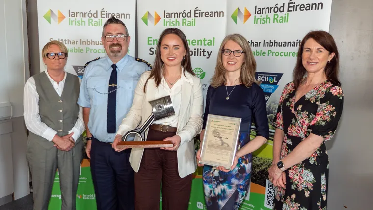 Arup staff members collecting Iarnród Éireann Sustainability Award for Emission Reduction Impact.