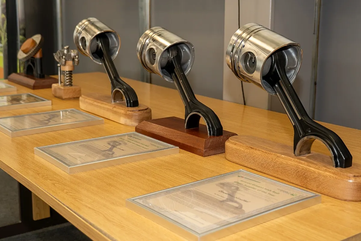 A table with the Iarnród Éireann Sustainability Awards trophies on it.