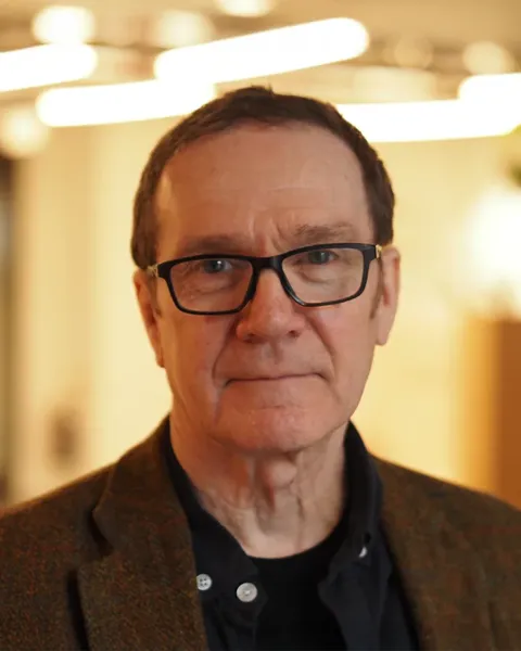 A man wearing glasses.