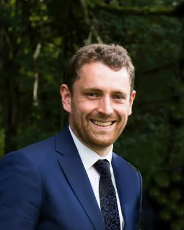 A man in a suit and tie.