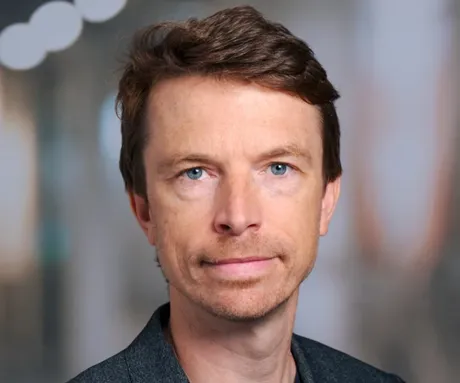 A man with blue eyes.