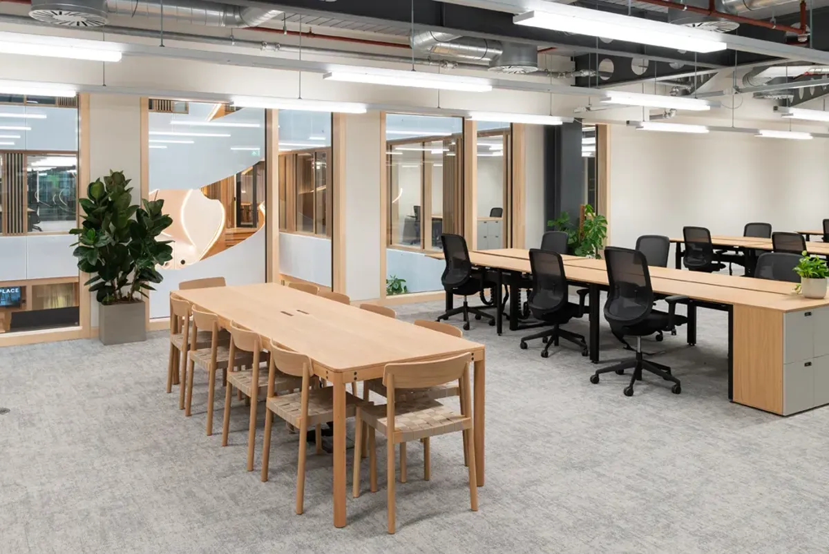 A room with tables and chairs.