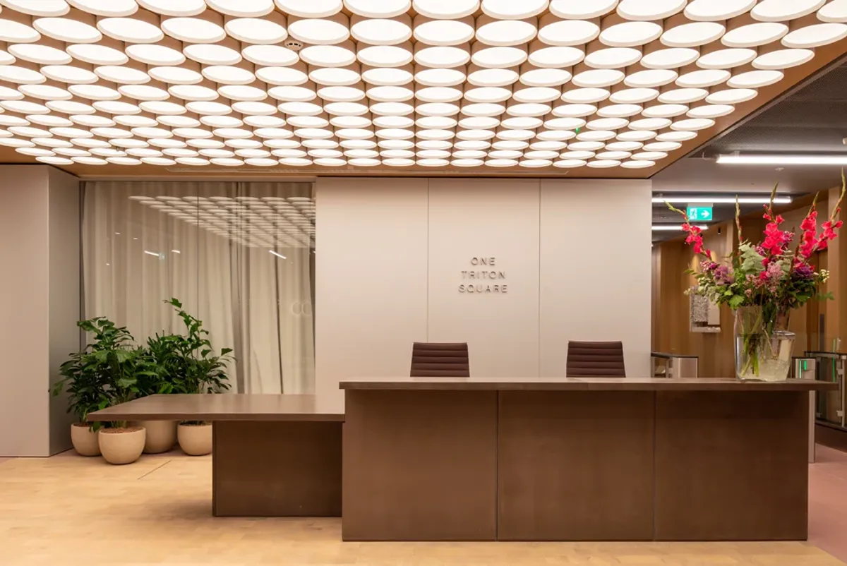 A room with a table and chairs.