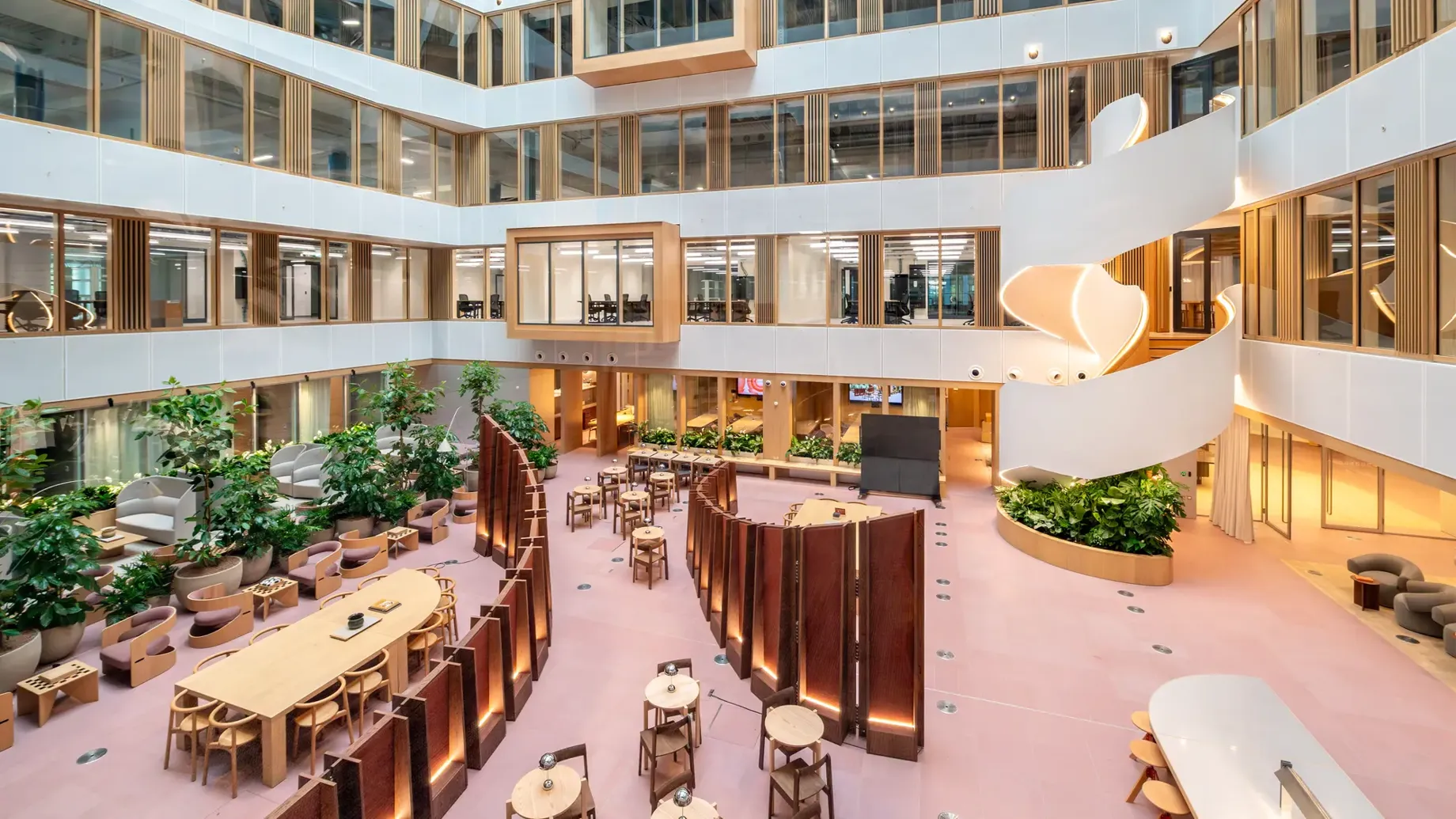 A large building with tables and chairs.