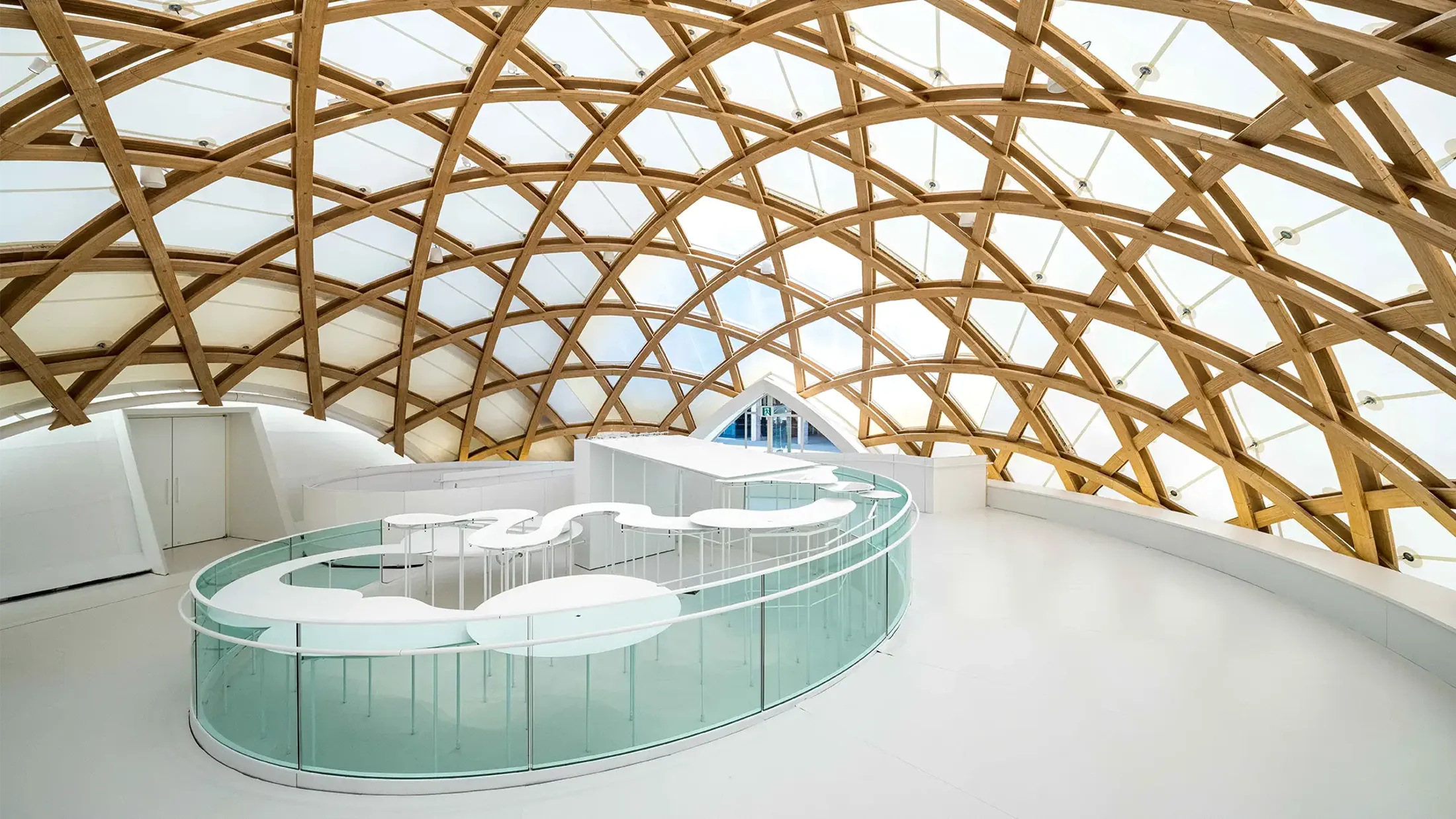 A large room with a pool.