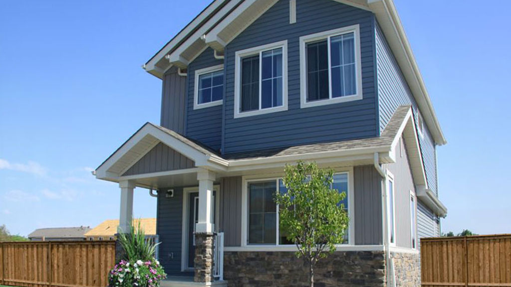 A house with a stone wall.
