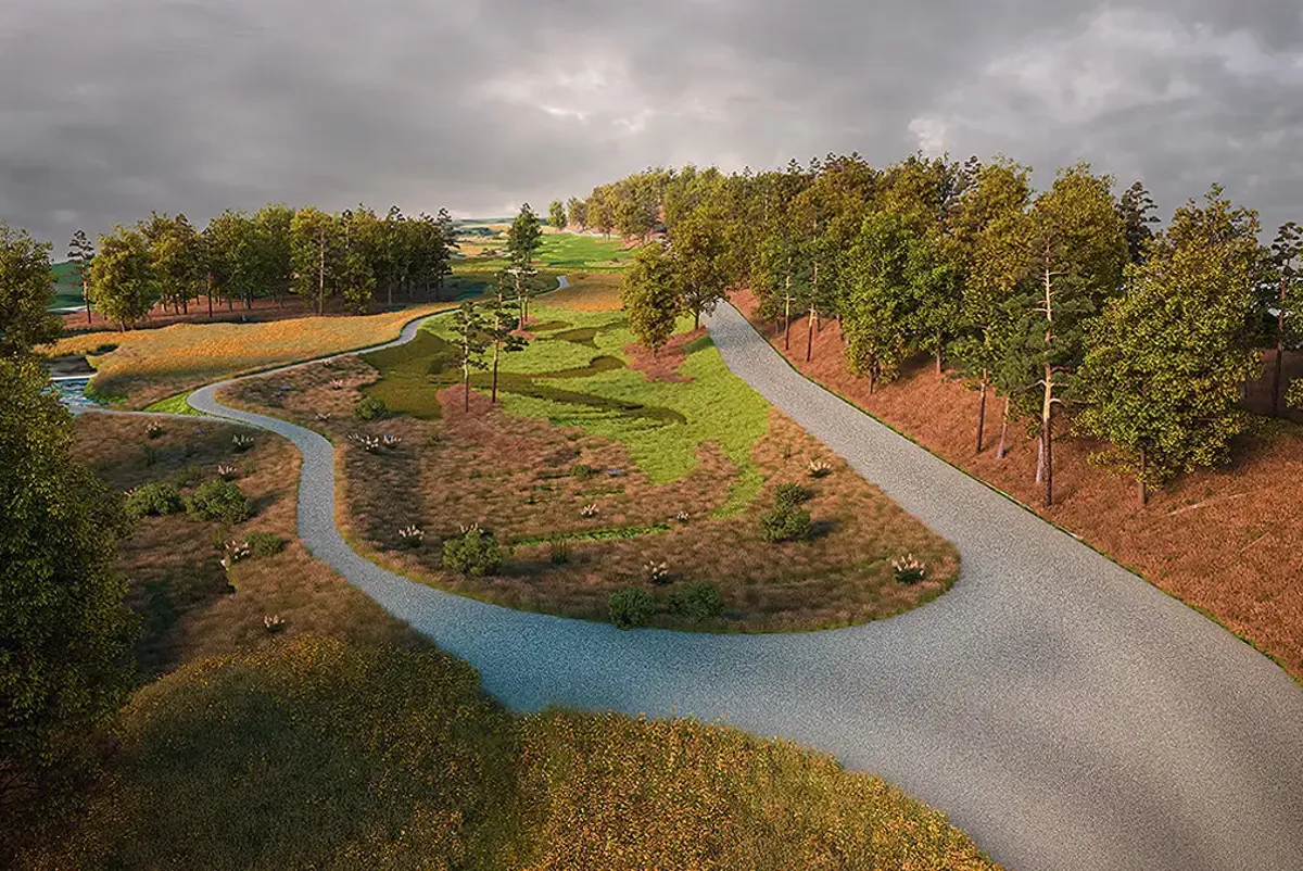 A river running through a green landscape.