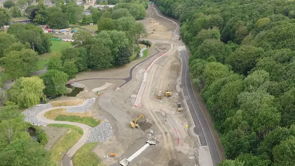 A road with trees and a road.