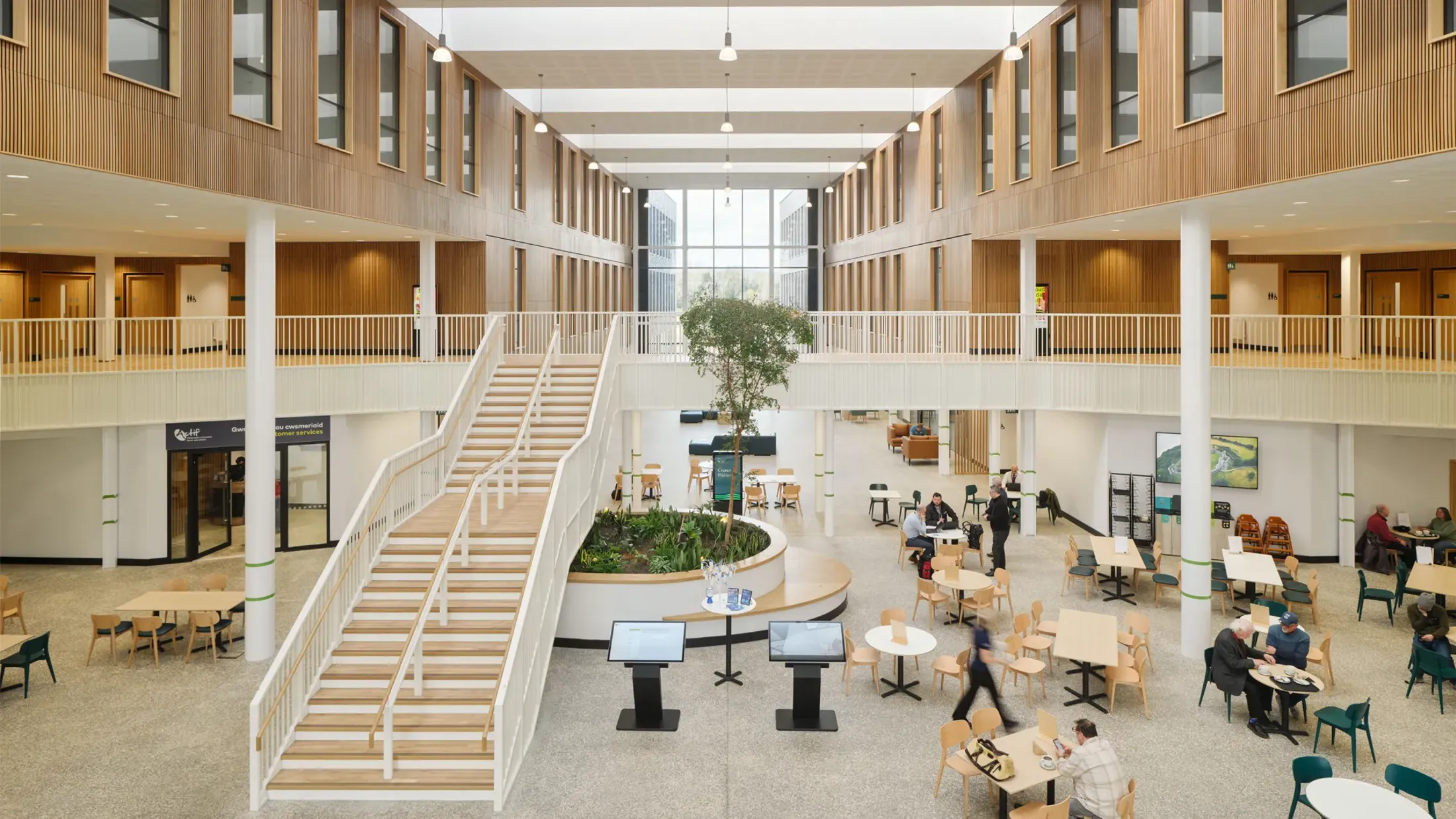 A group of people in a large building.
