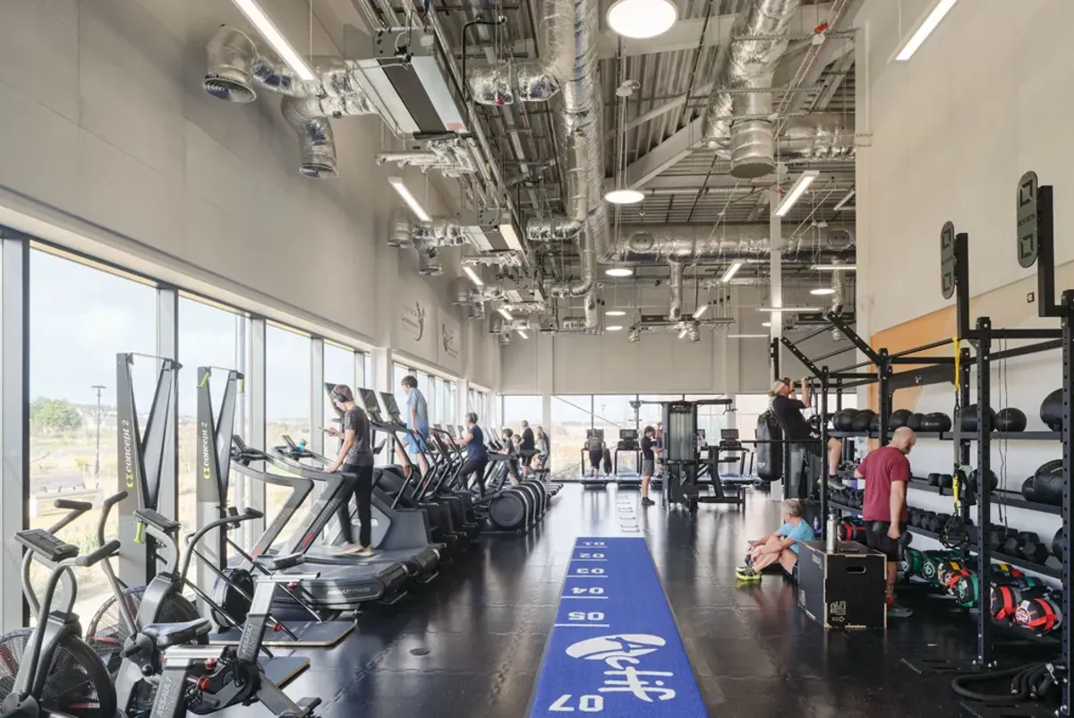 A group of people working out in a gym.