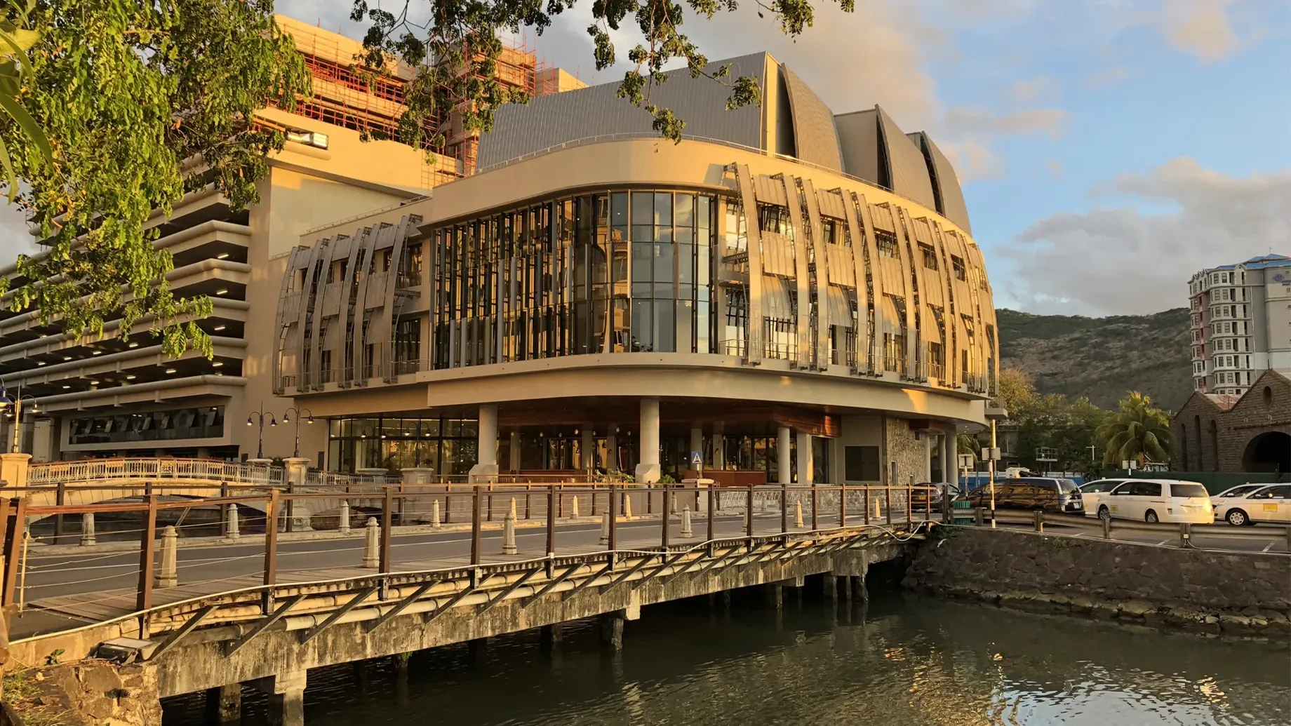 A building with a bridge over water.