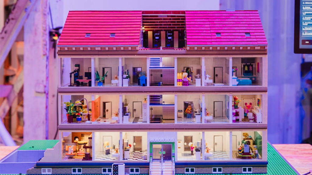 A toy house with a pool.
