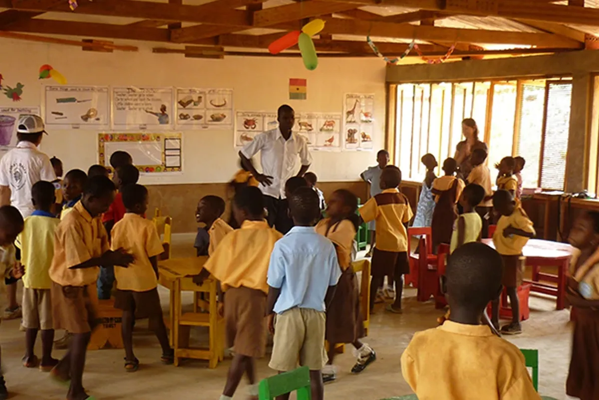 A group of children in a classroom.