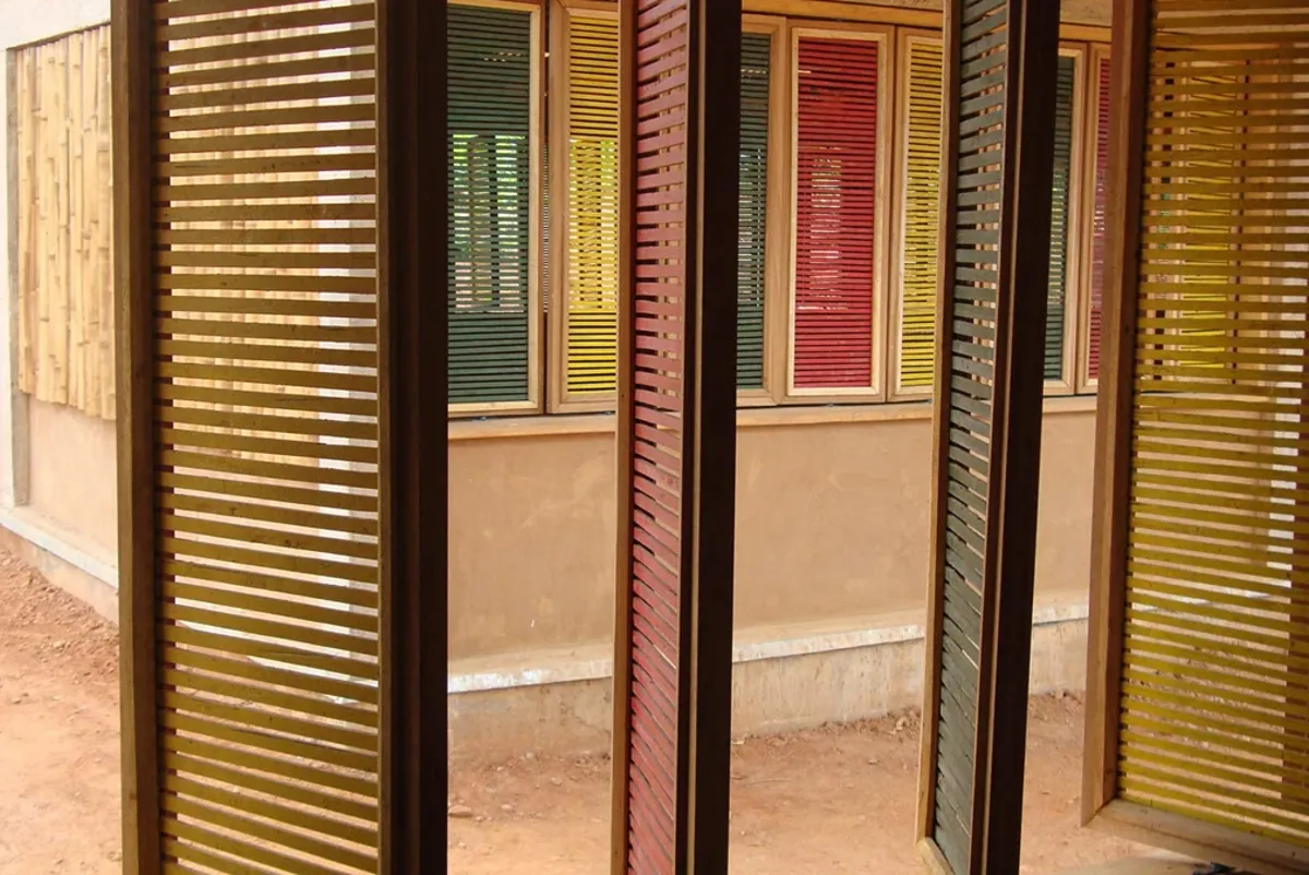A building with green shutters.