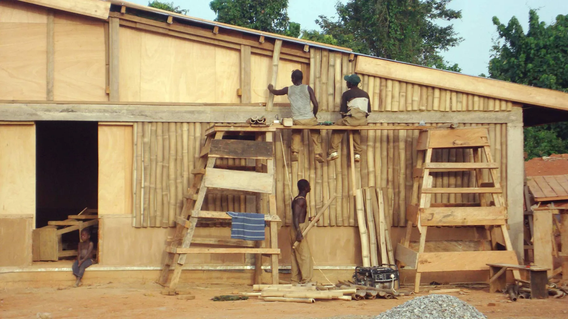 A group of people on a house.