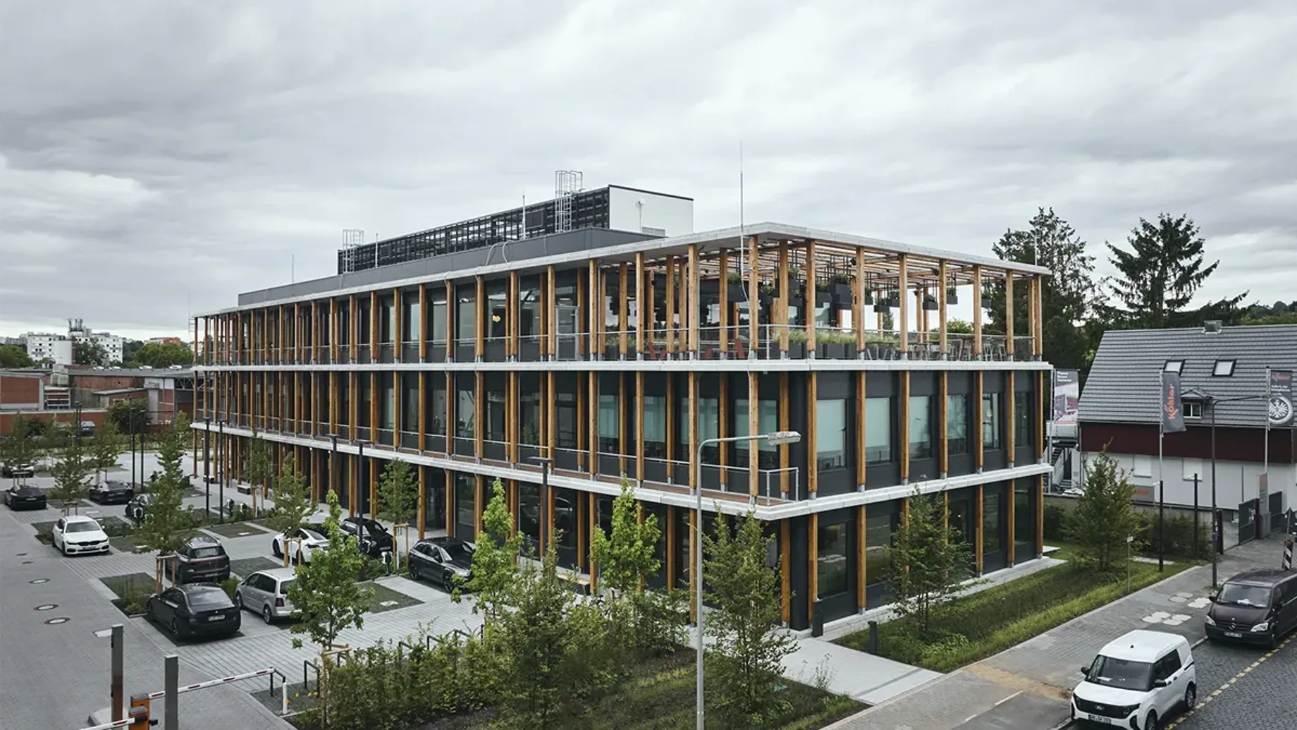 A building with cars parked in front.