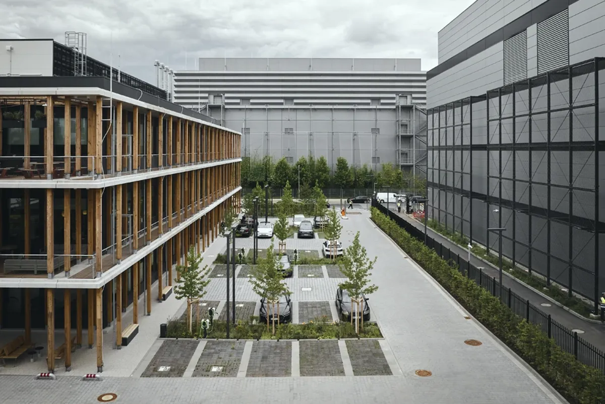 A street with cars and buildings.