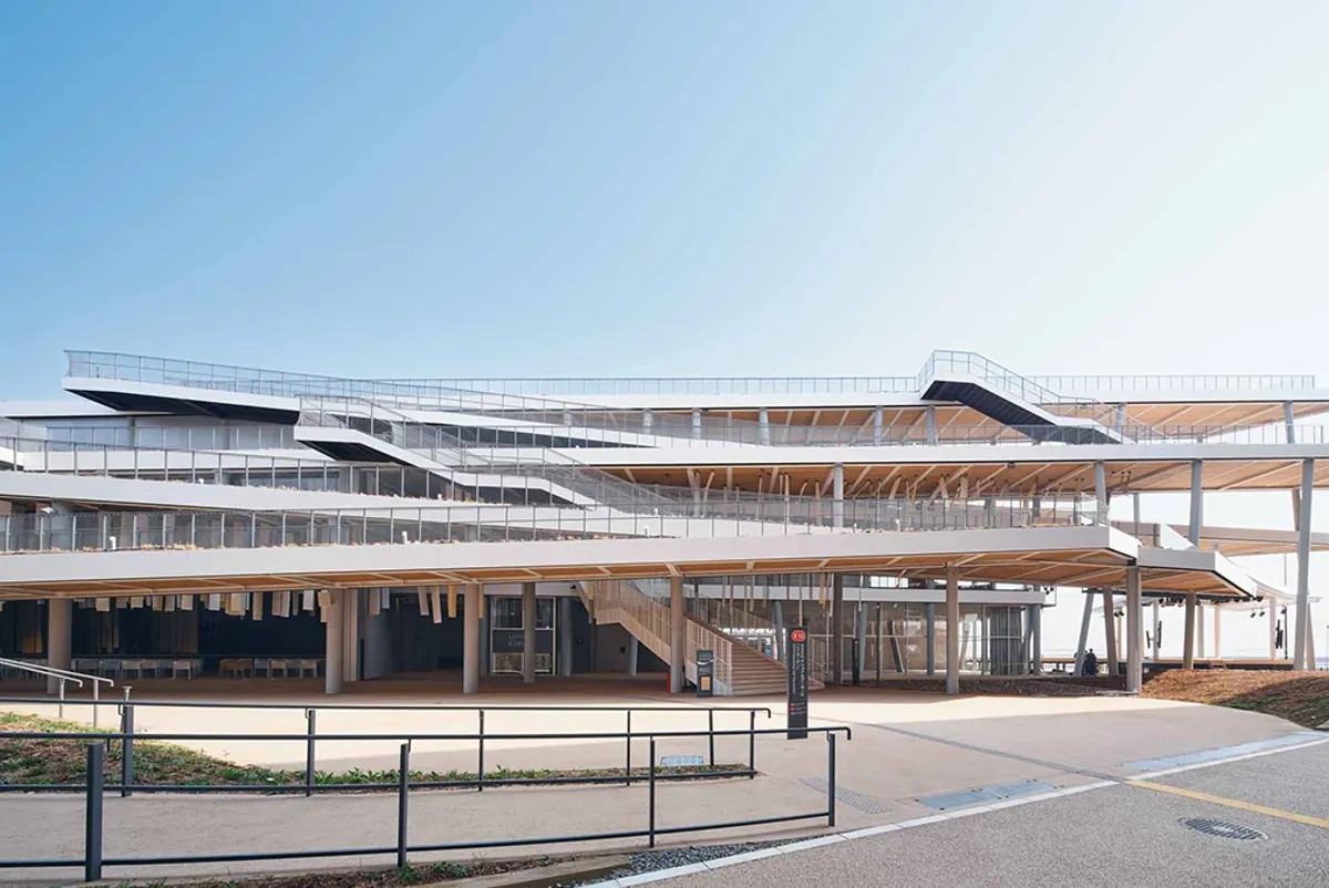 A large building with a large roof.