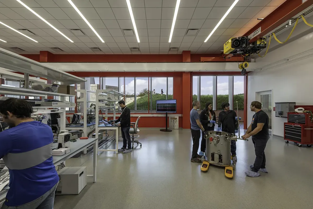 A group of people in a room.