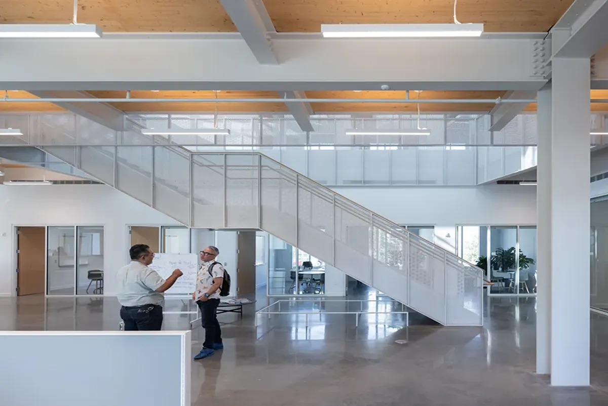 A few men in an office.