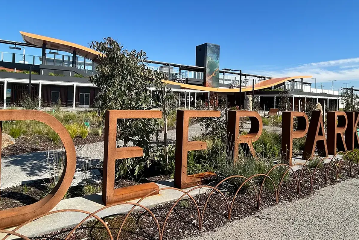 Deer Park sign in front of station