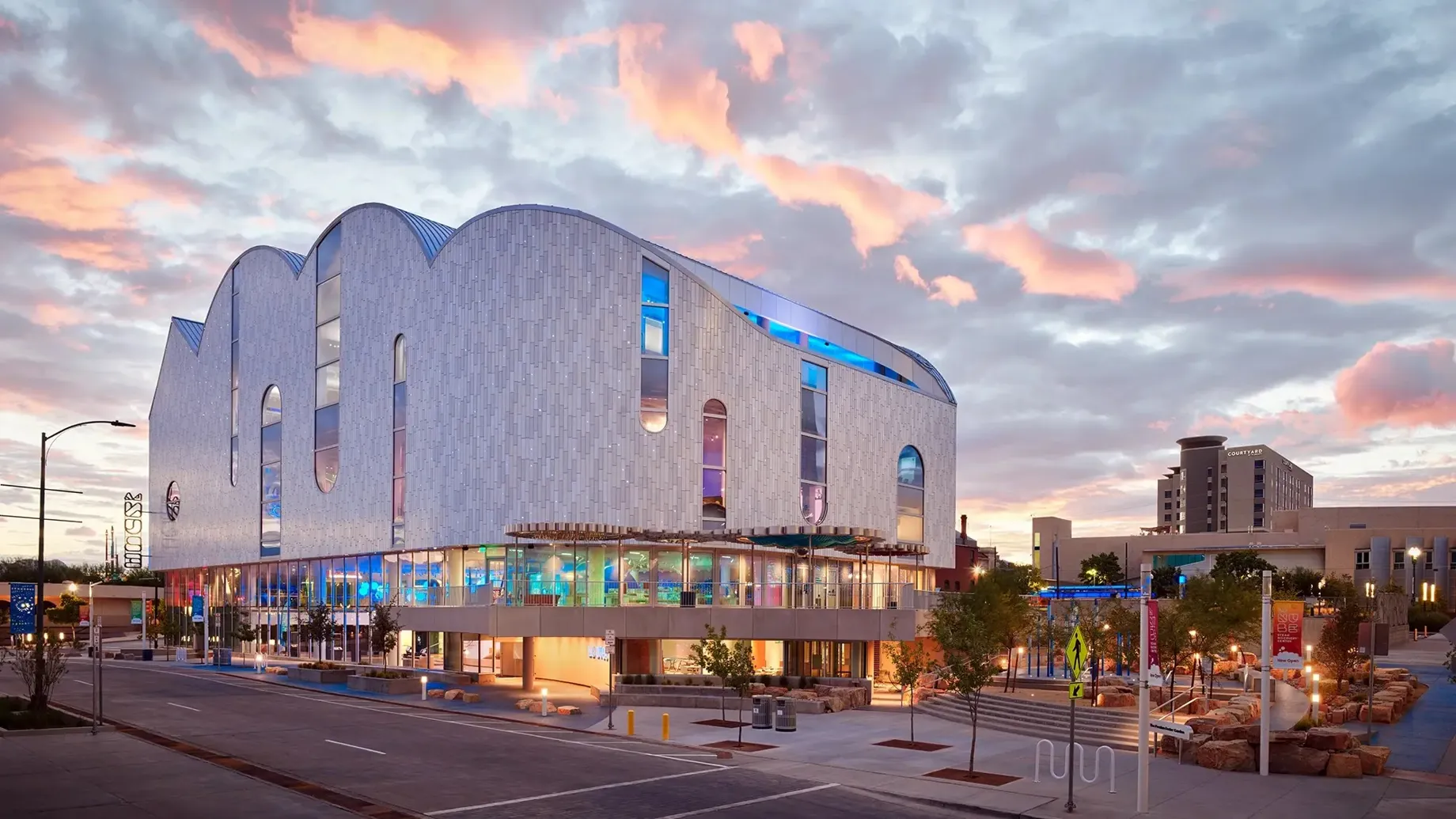 The exterior of La Nube, with colorful and illuminated windows