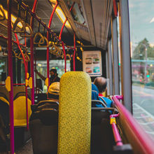 A bus with people on it.