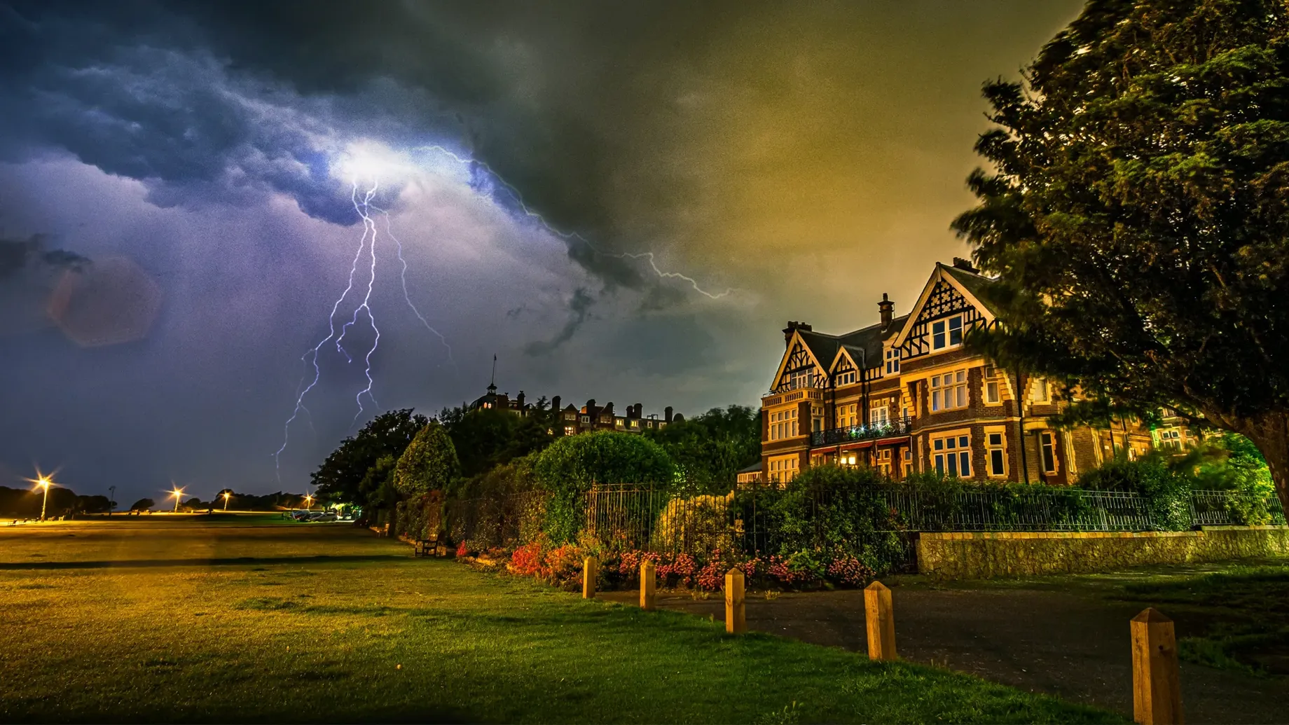 A house with a lightning bolt striking it.