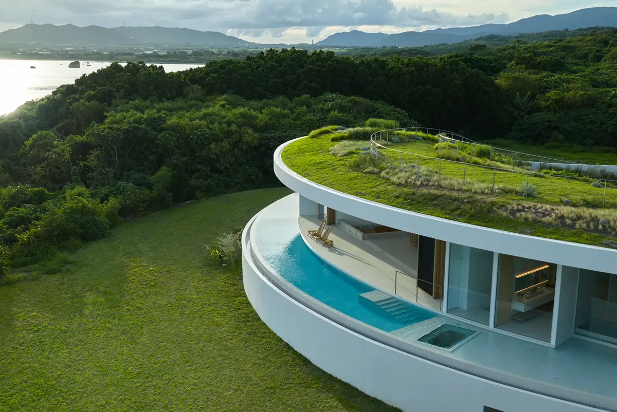 The villa’s circular design responds to the site’s natural contours