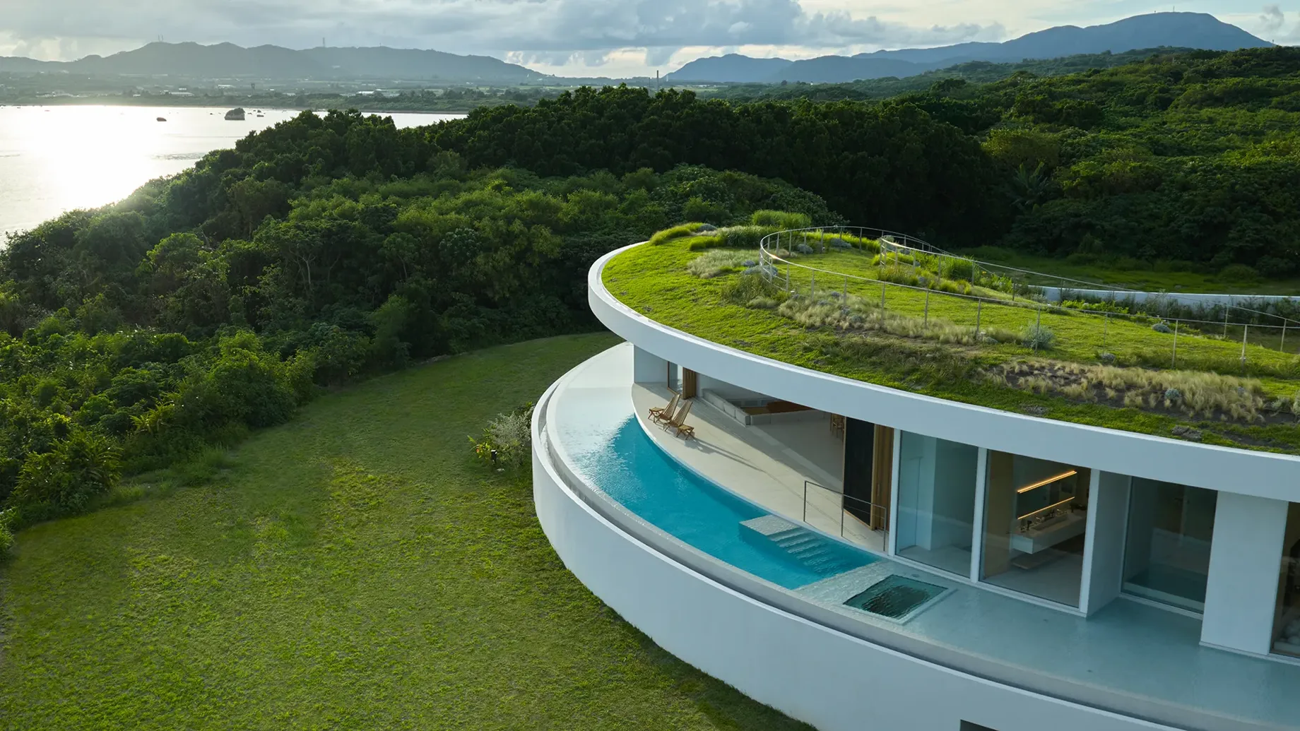 The villa’s circular design responds to the site’s natural contours