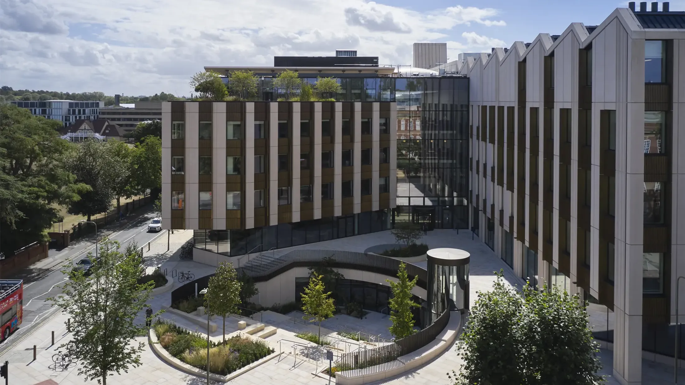 A building with a courtyard and trees.