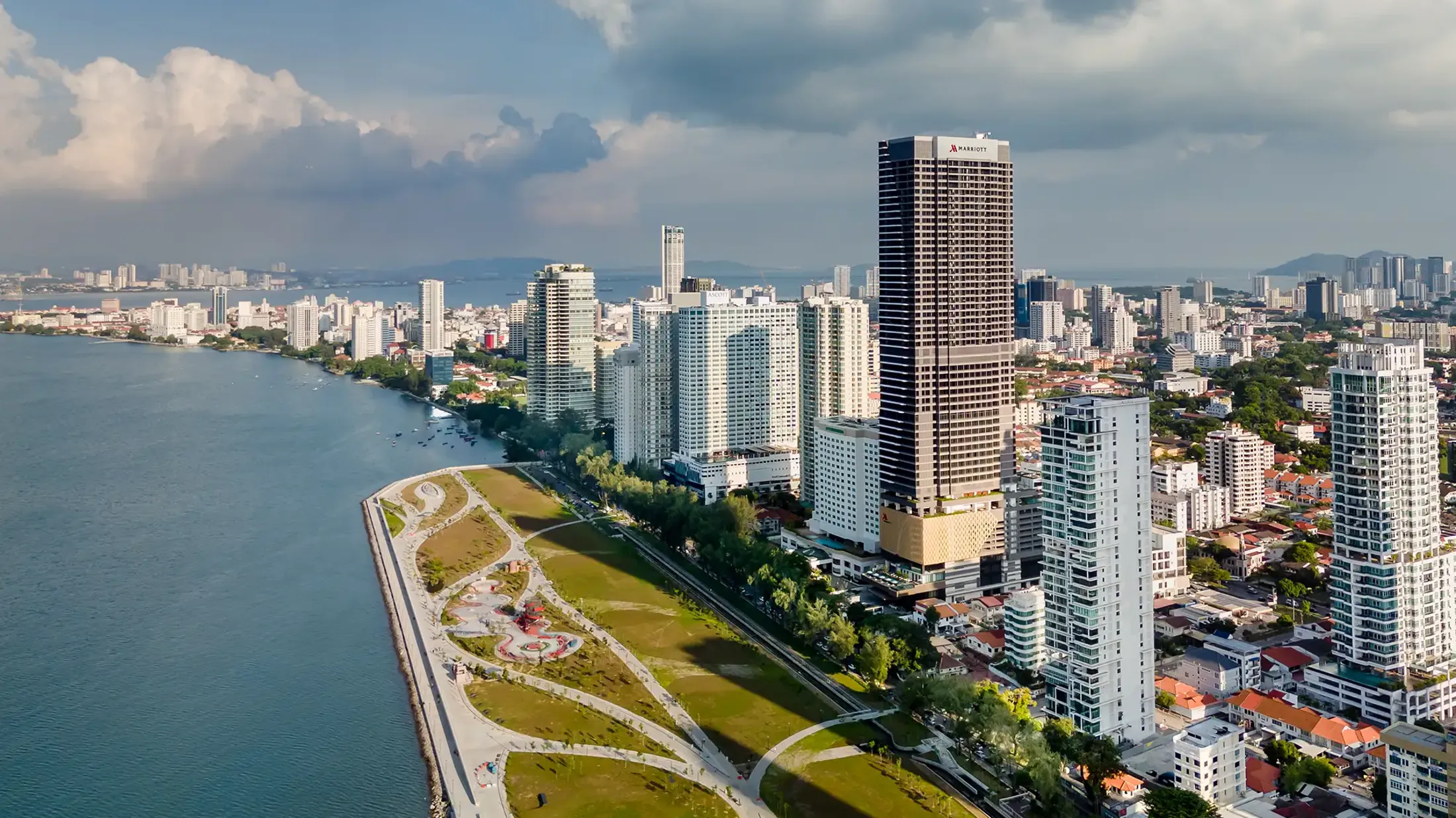 A skyline of tall buildings on the Penang waterfront