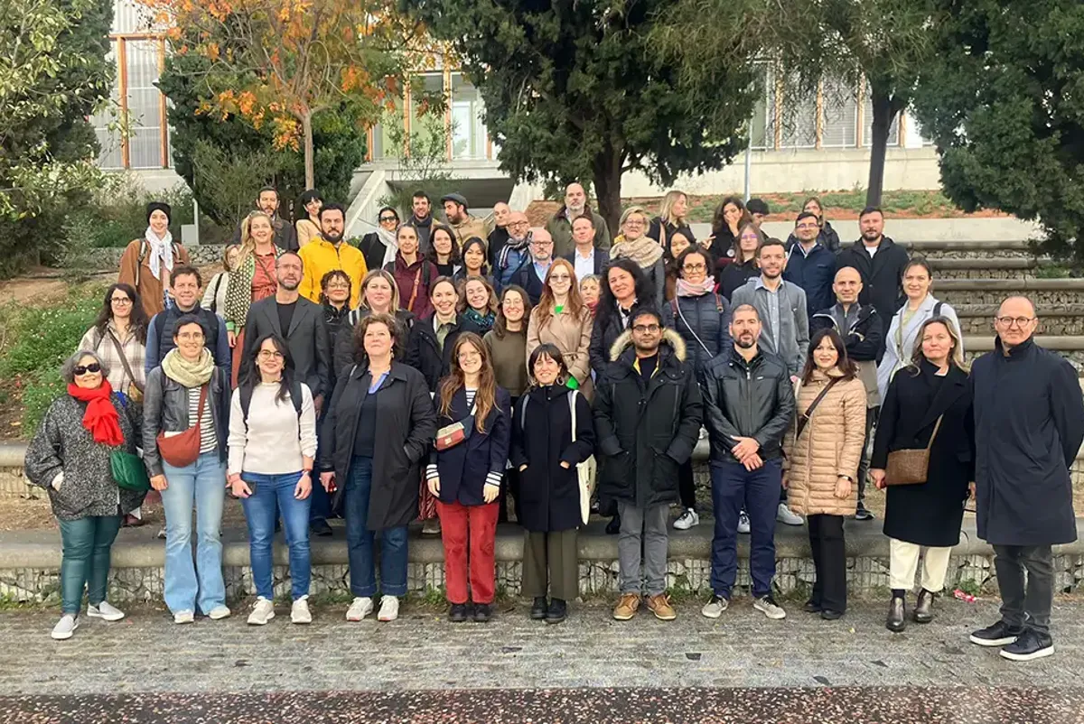 Company representatives from ReGreeneration participants posing for a photo in a park.