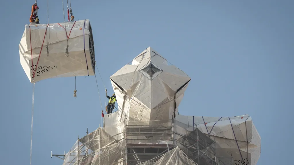 Lowering the Jesus Cross into place