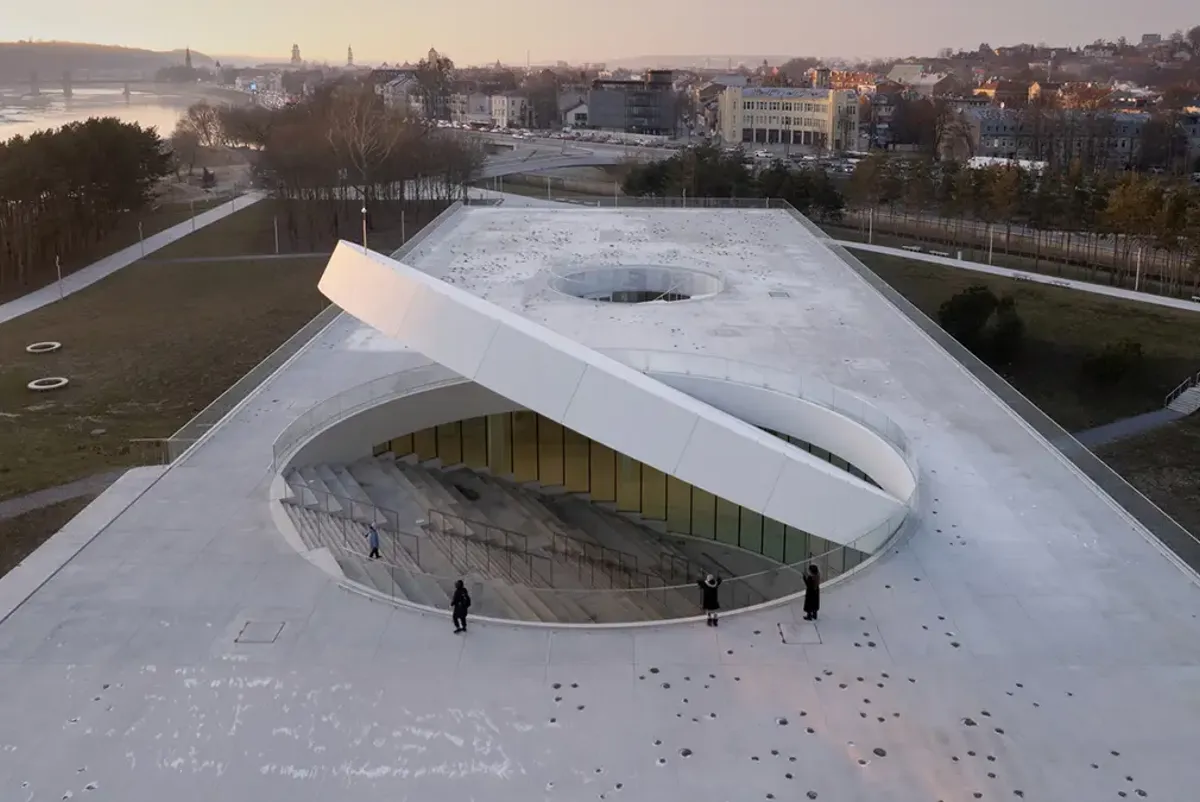 A building with a curved roof.