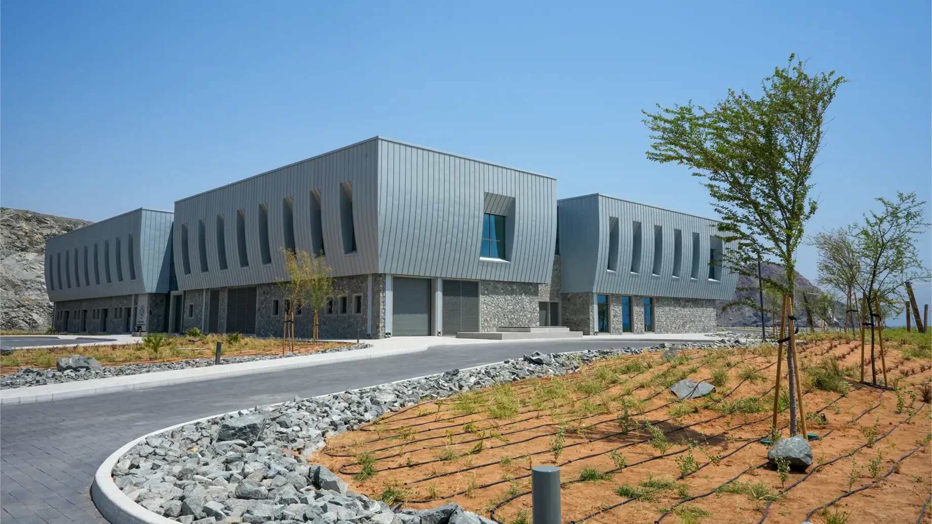 A building with a stone path.